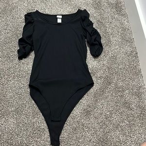 Black body suit with quarter half ruffled sleeves